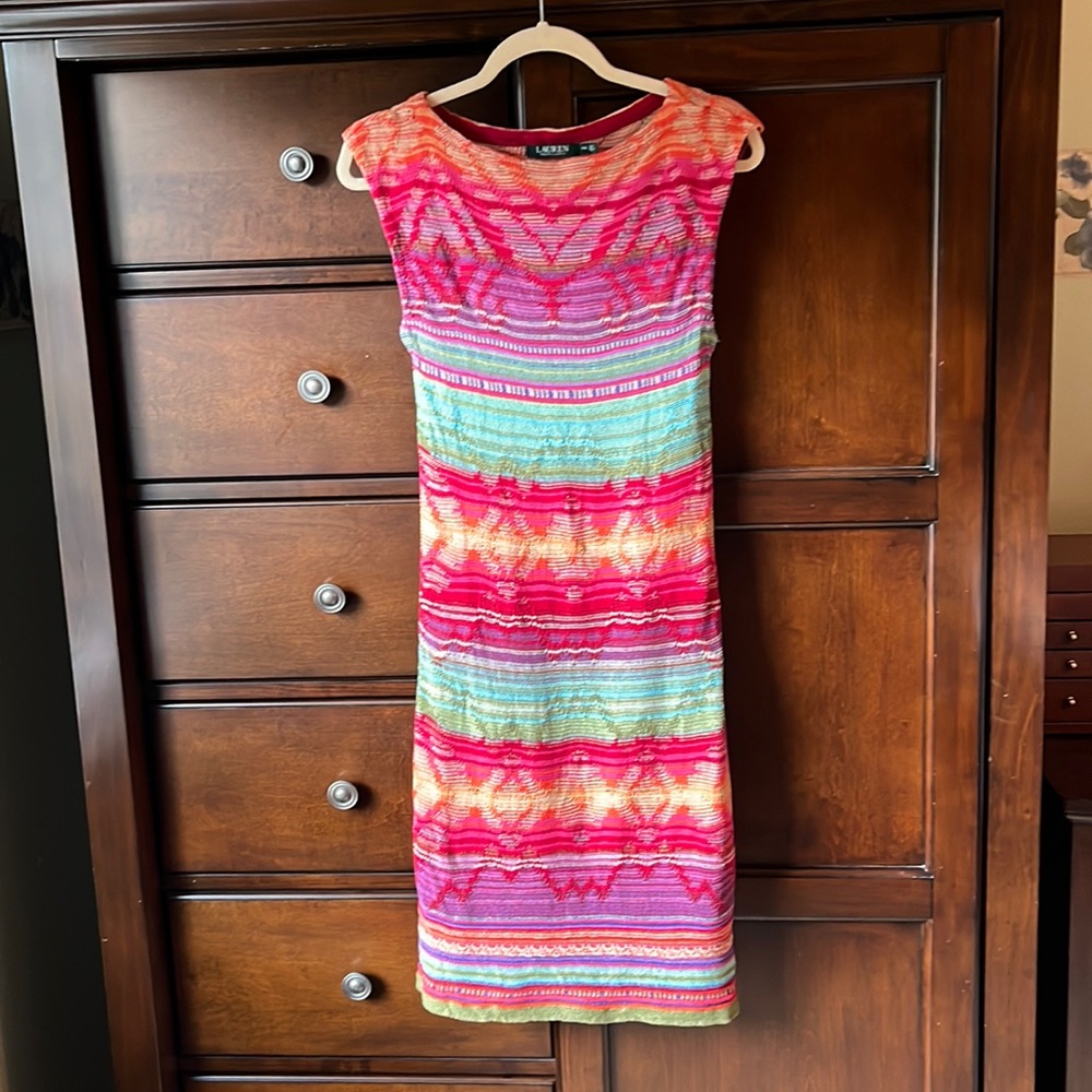 Multi colored  sweater dress. Worn once in excellent preowned condition.